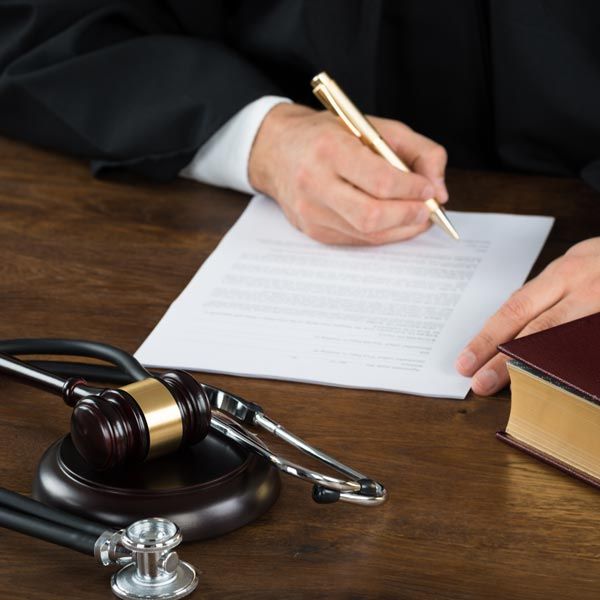 Man signing document