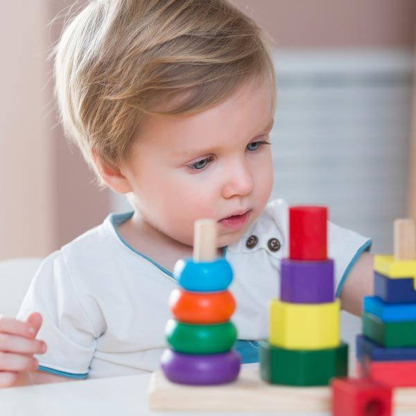 Toddler playing with toy